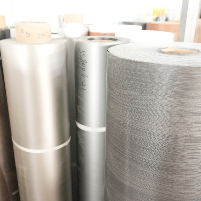 2 Bulk raw pvc base film rolls stored in factory workshop