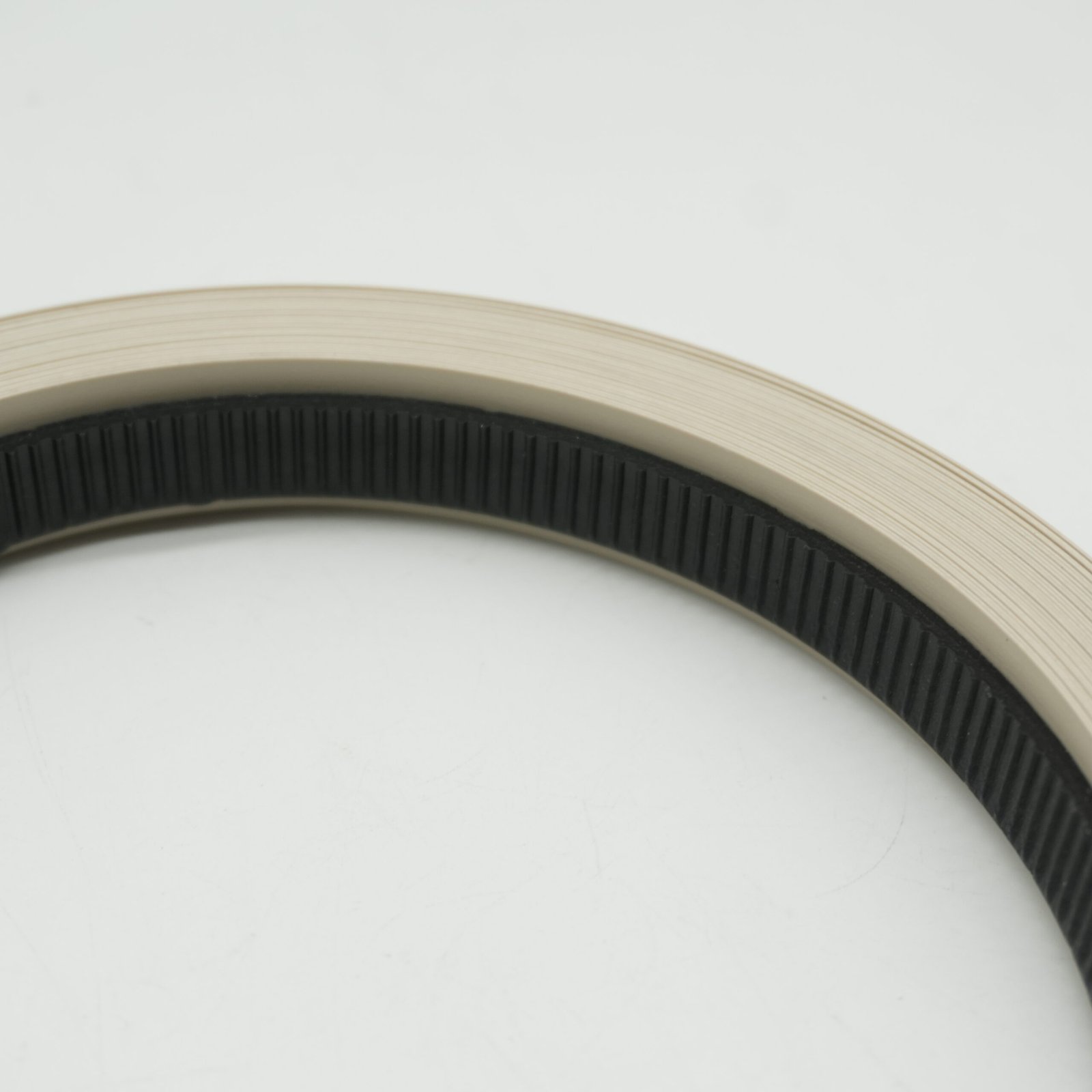 Close-up of a sample of PVC edge banding strip rolls