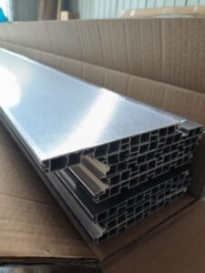 Film-covered aluminum plastic skirting board profiles ready for packaging