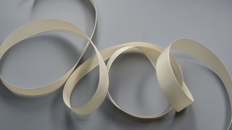 Bonding different packaging materials