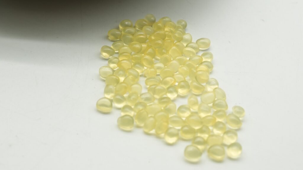 Pale yellow hot melt adhesive granules